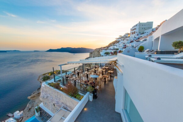 Dining at Black Rock Restaurant belonging to our Santorini hotels caldera view by Secret