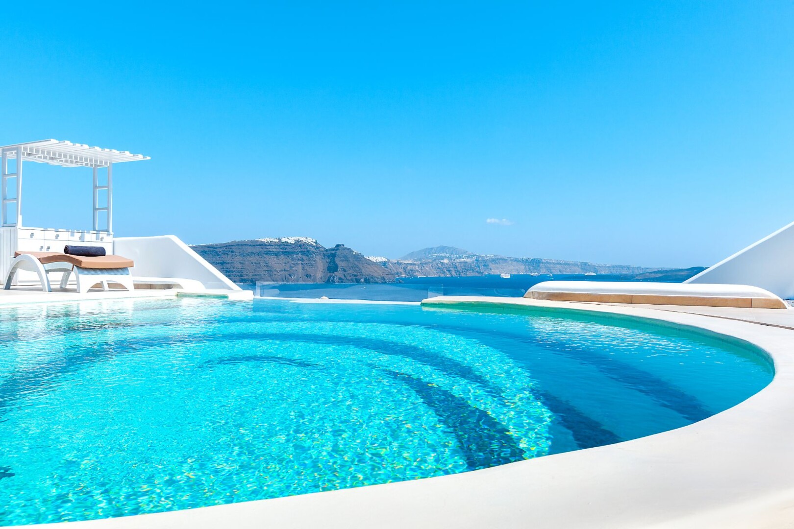 The spiral pool at Santorini Secret Premium, one of the Santorini hotels caldera view by Secret