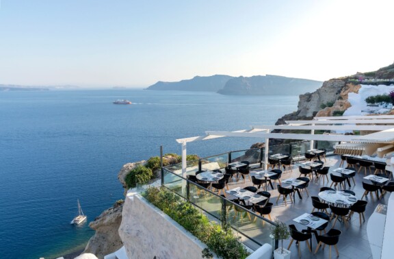 Amazing vistas at Black Rock Santorini restaurant with a view overlooking the Caldera cliff and volcano